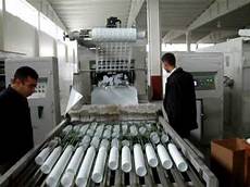 Cup manufacturing machine