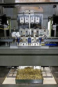 Cup manufacturing machine