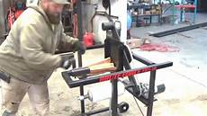 Shrink wrapping machine