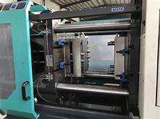 Syringe manufacturing machine